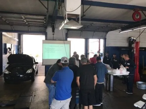 3A Automotive technicians participating in hands-on diagnostic workshop with industry expert Eric Ziegler