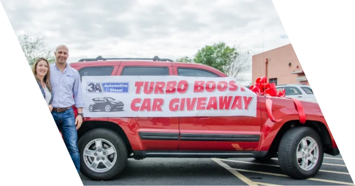 A bright red SUV featured in the "Turbo Boost Car Giveaway" by 3A Automotive, supporting local families.
