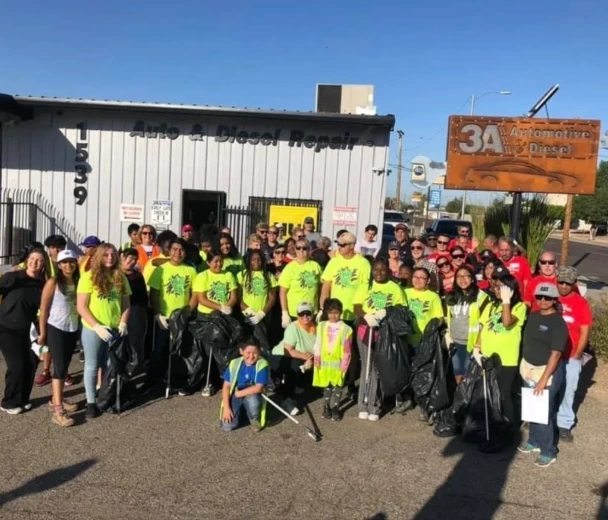 2018 Turbo Boost Car Giveaway ceremony showing the Sunnyslope Elementary School teacher receiving her donated vehicle from 3A Automotive