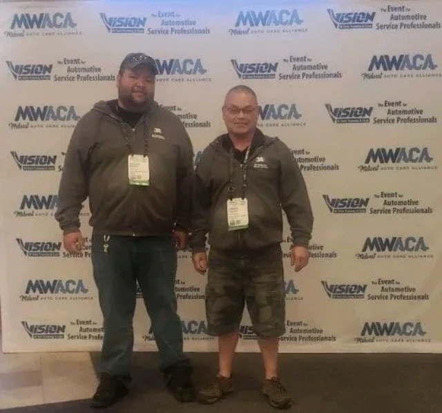 3A Automotive team members at the Vision Hi-Tech Training & Expo in Kansas City in 2022, attending advanced automotive industry training sessions
