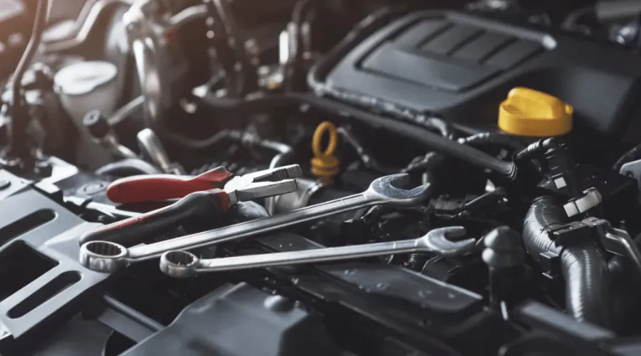 Professional mechanic performing oil change service