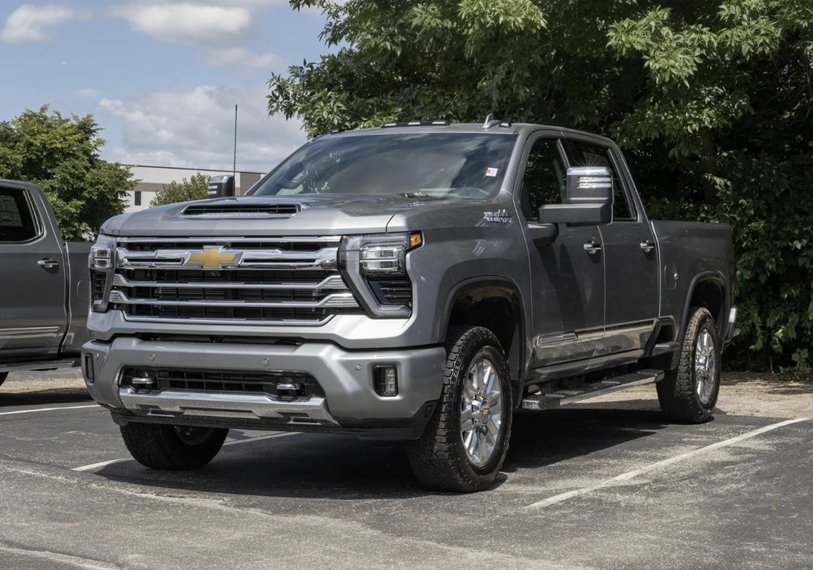 Professional mechanic performing oil change service