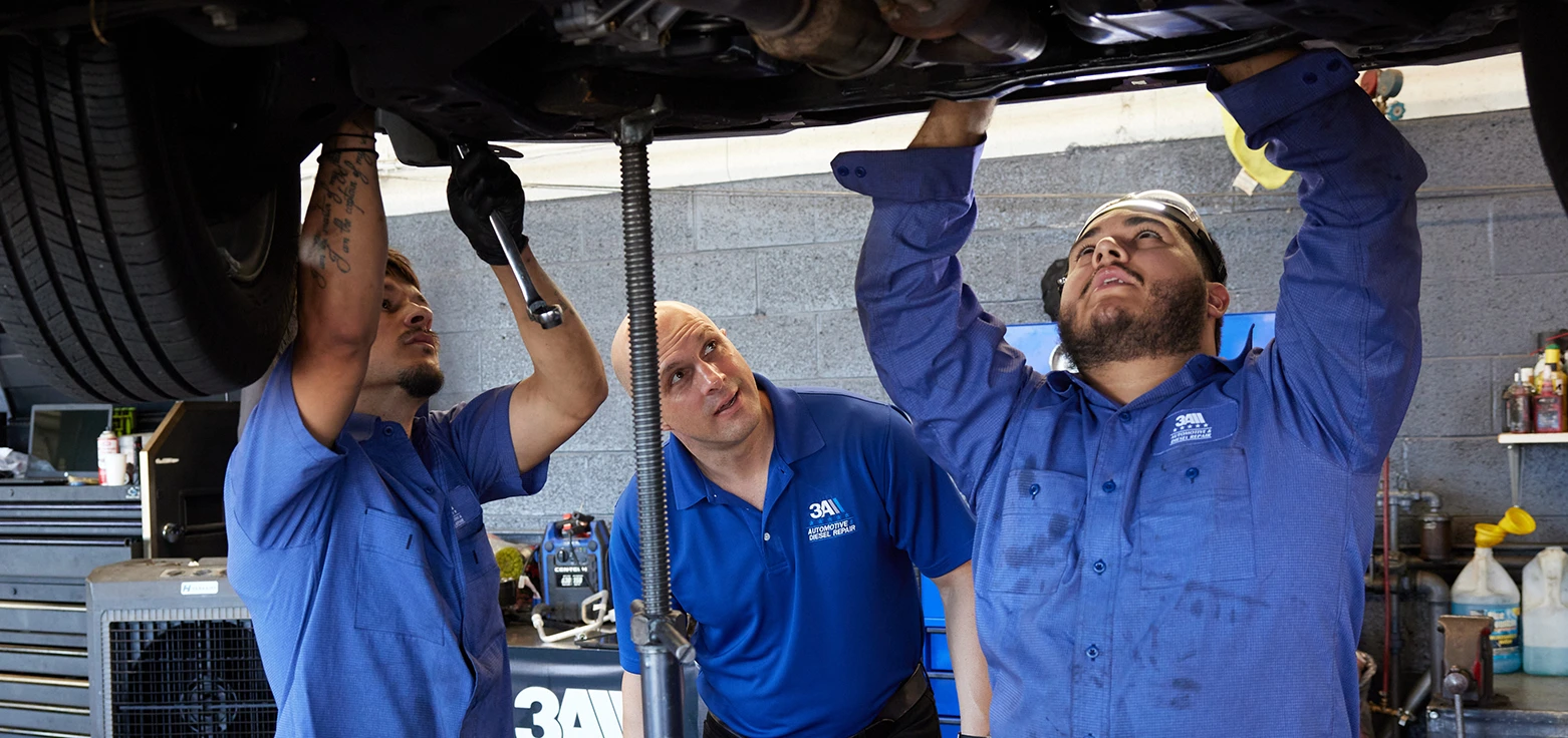Professional mechanic performing oil change service