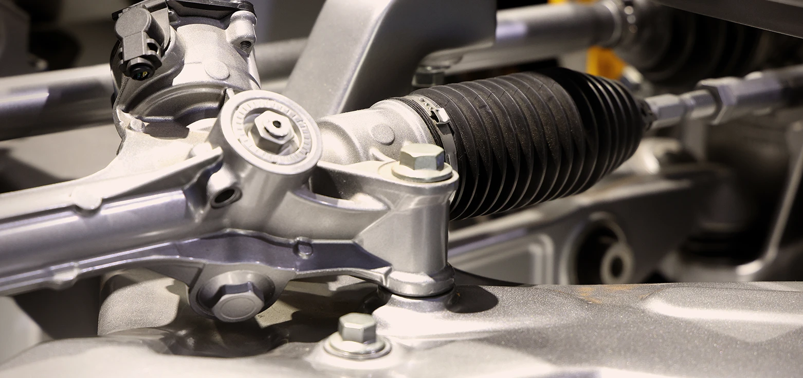 Professional mechanic performing oil change service