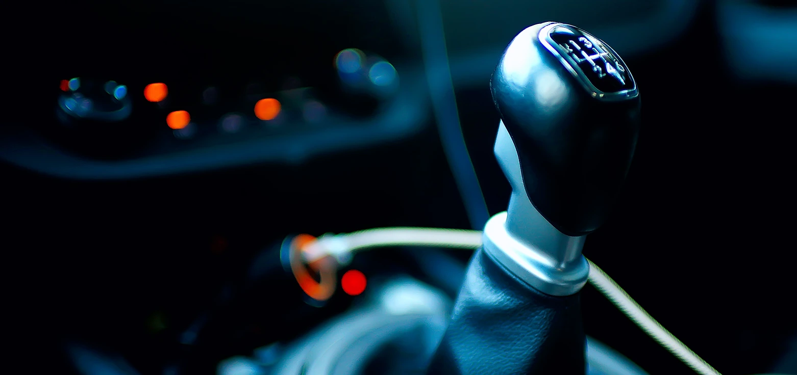 Professional mechanic performing oil change service