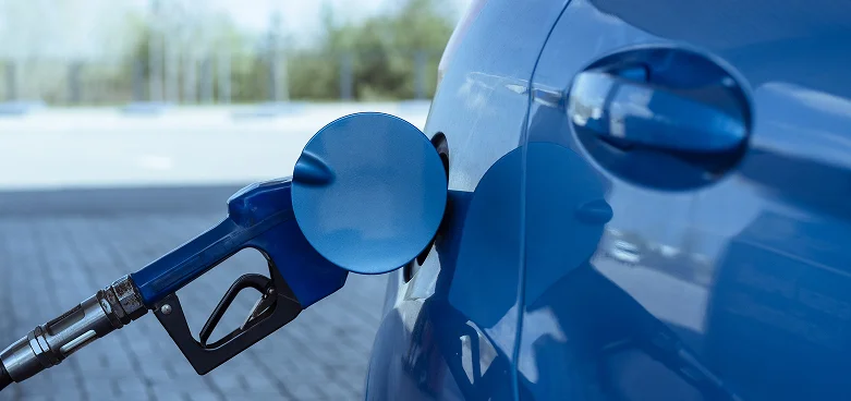 Professional mechanic performing oil change service